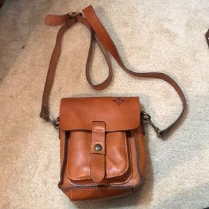 Patricia Nash cross body purse color tan